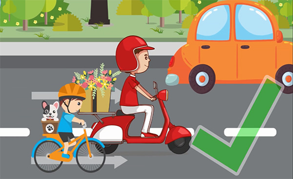 Đội mũ bảo hiểm khi đi xe máy, xe đạp điện